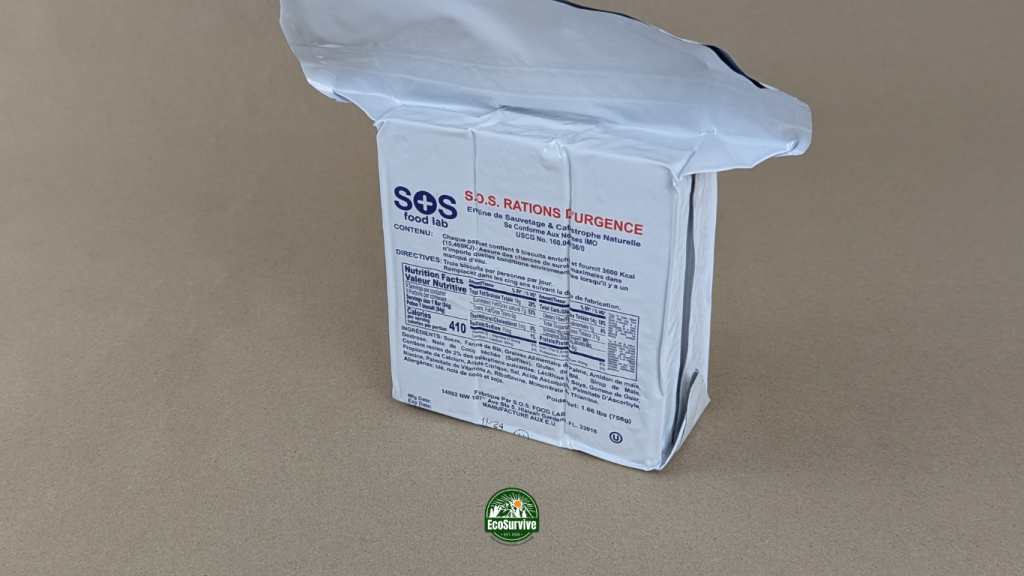 3600 kcal S.O.S. emergency food bar in vacuum-sealed silver packaging on kraft paper